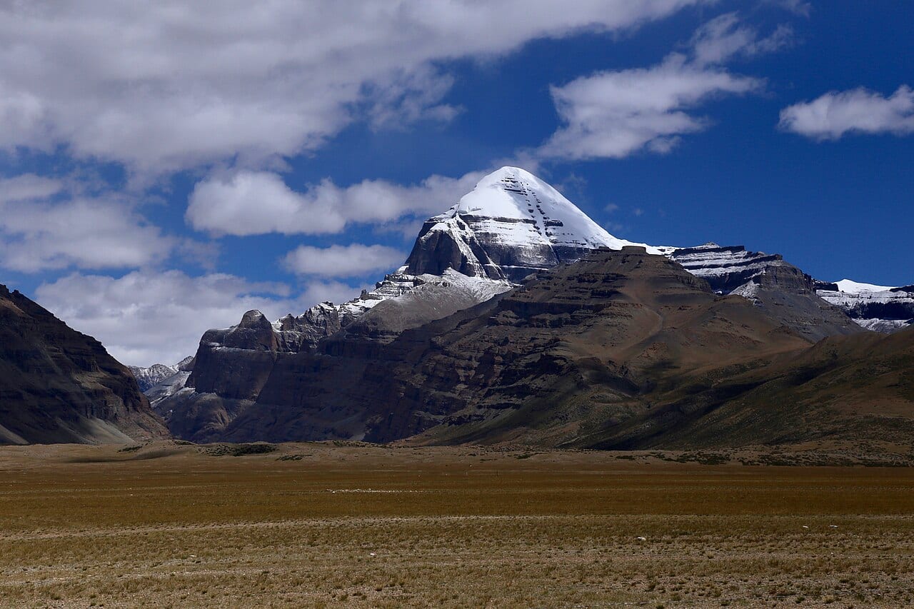 Snow-covered Mount Kailash mountain under a clear sky