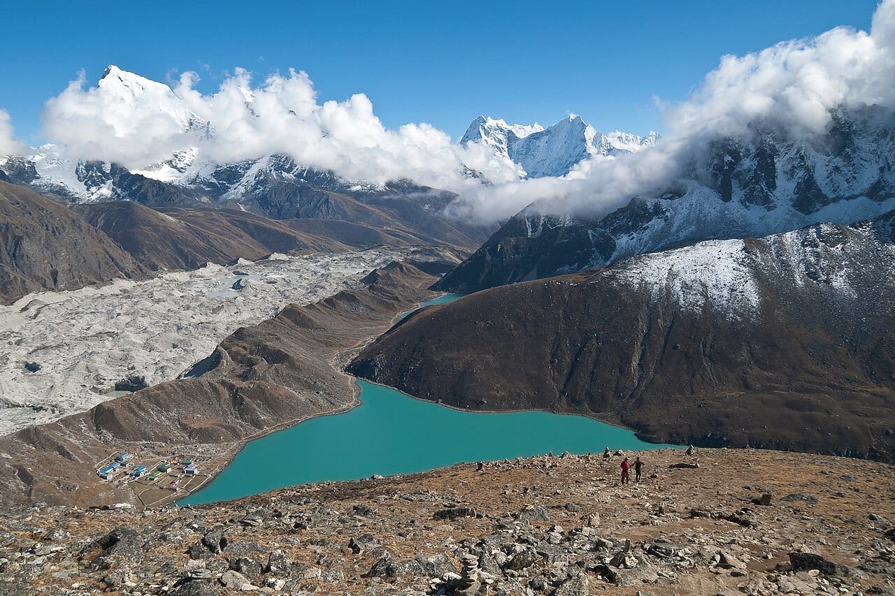 A snow-covered Himalayan glacier on a steep mountain