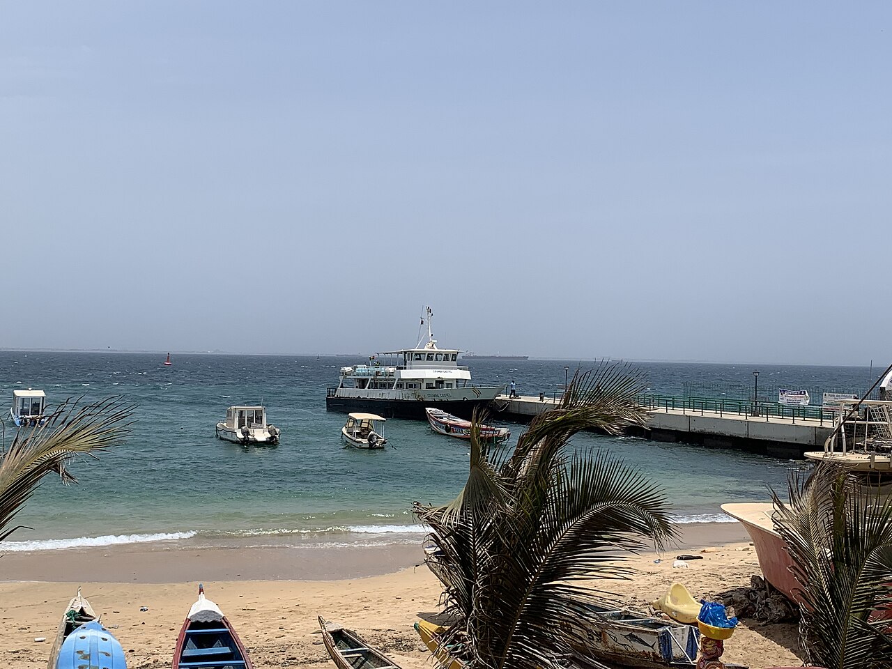 The ferry from Dakar at the pier next to Gorée Island's small beach